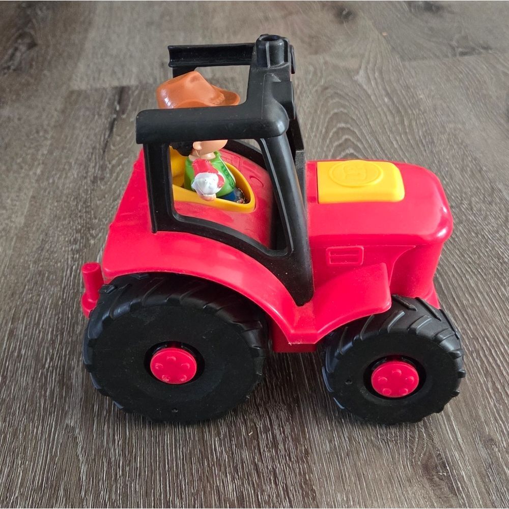 Fisher-Price Little People Caring for Animals Tractor & Farmer Figure